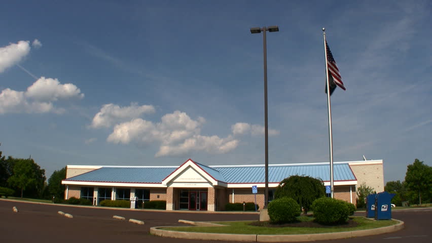 US Post Office full view with flag