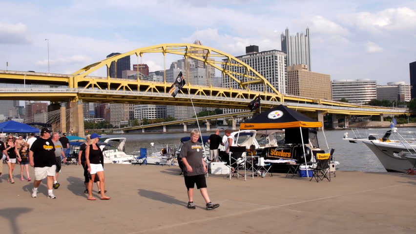 PITTSBURGH, PA, Circa August, 2013 - Sports fans walk on the north side near