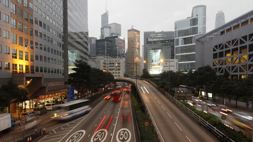 Hong Kong landmark and city traffic at night - 4K