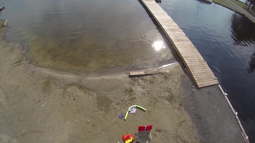 Aerial of Cottages, Lake, Boats and Docks