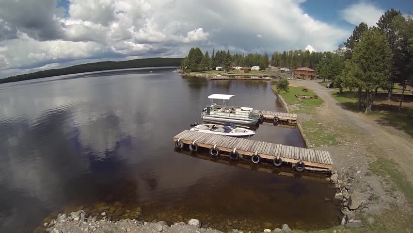 Aerial of Cottages, Lake, Boats and Docks