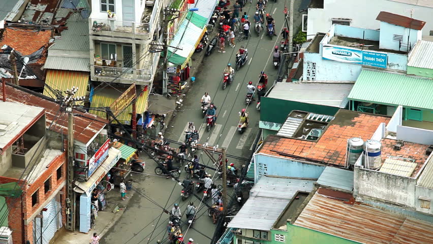 HO CHI MINH CITY - AUGUST 8: Aerial view of scooter traffic in Ho Chi Minh City,