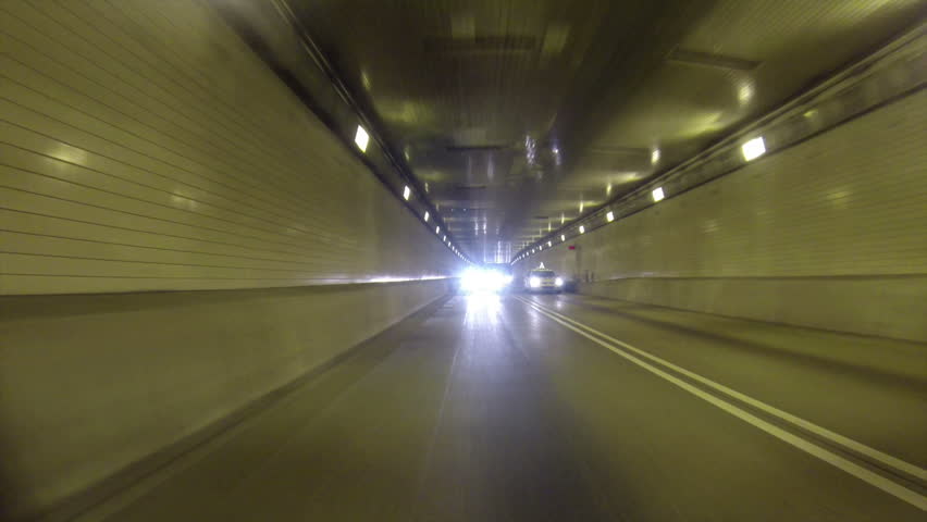 A rear view perspective of driving into the Fort Pitt Tunnel in Pittsburgh,