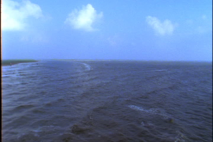 Aerial over rough surface and wake in the Mississippi River.