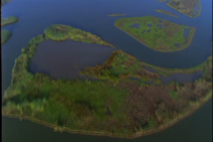 Aerial over marshes, lowlands and islands in the lower Mississippi River.