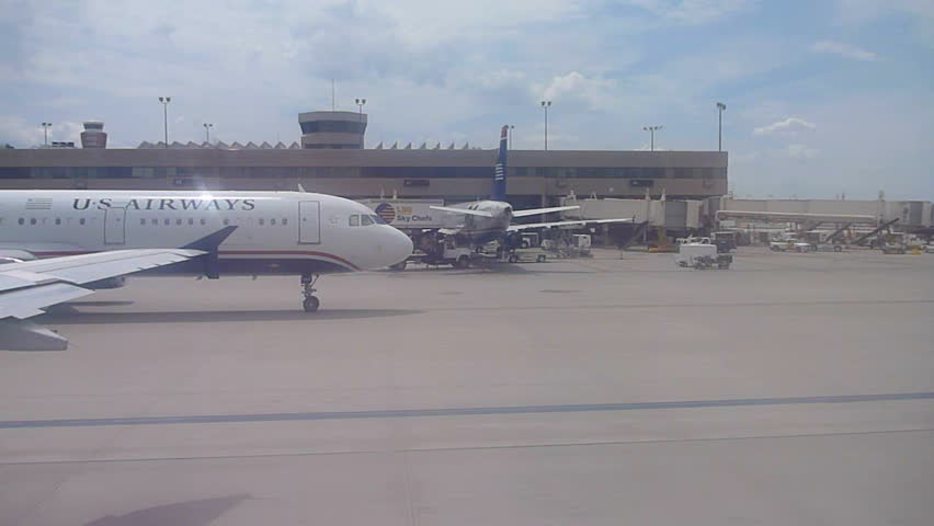 MINNEAPOLIS, MINNESOTA AIRPORT - CIRCA 2013: US Airways airplane arrives in