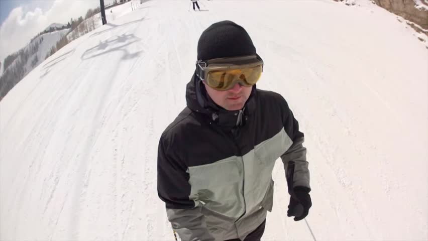 Downhill skiing at a beautiful mountain ski resort after a fresh snowfall