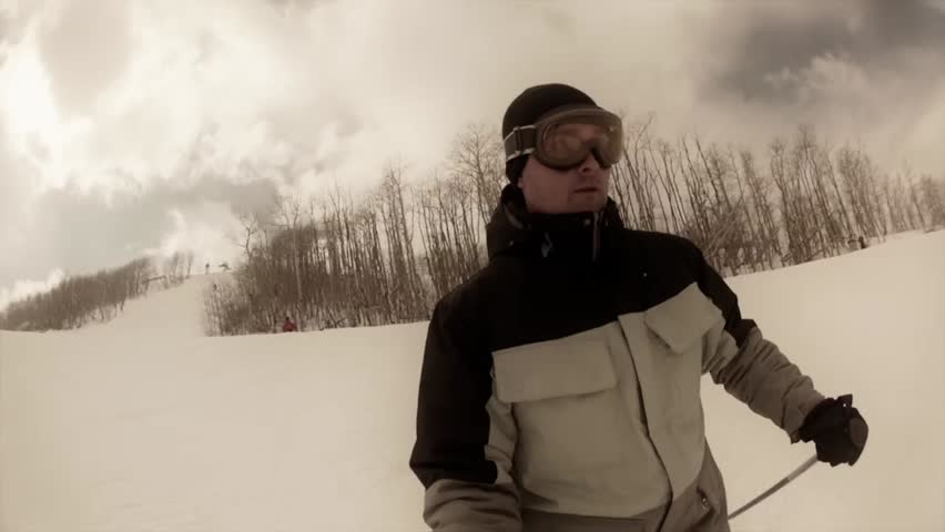 Downhill skiing at a beautiful mountain ski resort after a fresh snowfall