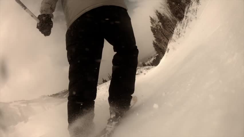 Downhill skiing at a beautiful mountain ski resort after a fresh snowfall