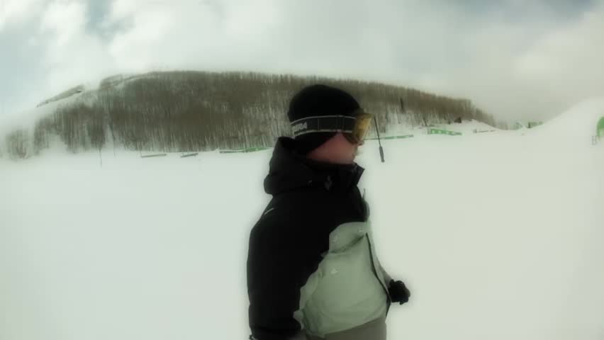 Downhill skiing at a beautiful mountain ski resort after a fresh snowfall