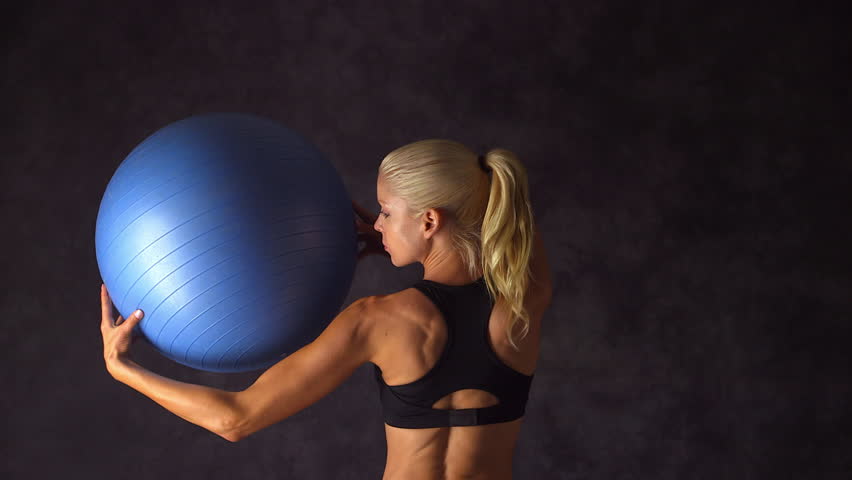 Woman Lifting an Exercise Ball Stock Footage Video (100 Woman Lifting an Exercise Ball Stock Footage Video (100