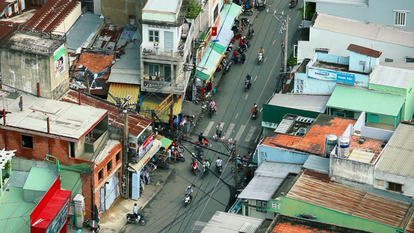 HO CHI MINH CITY - AUGUST 8: Aerial time lapse view of scooter traffic in Ho Chi