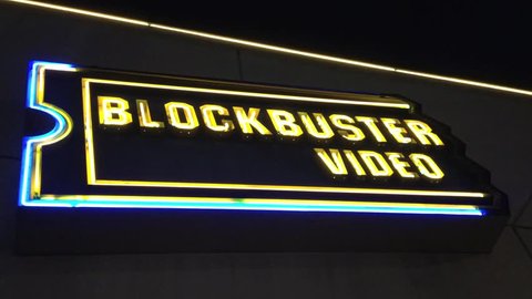 LOS ANGELES - JULY 2013 - A BlockBuster Video store closes its door as its business model is no longer economically viable