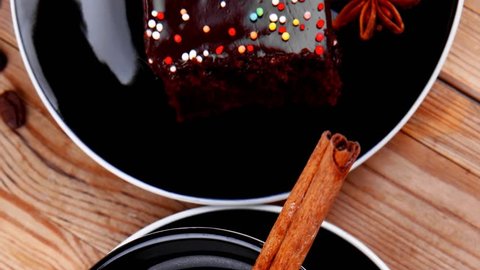 sweet food : hot black fragrant coffee and chocolate cake with cinnamon sticks coffee beans and anise star 1920x1080 intro motion slow hidef hd