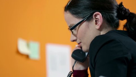Business woman depressed over lost documents, making a call