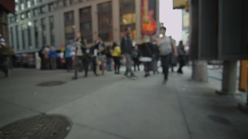 Crowds of tourists gather at Times Square in New York City.