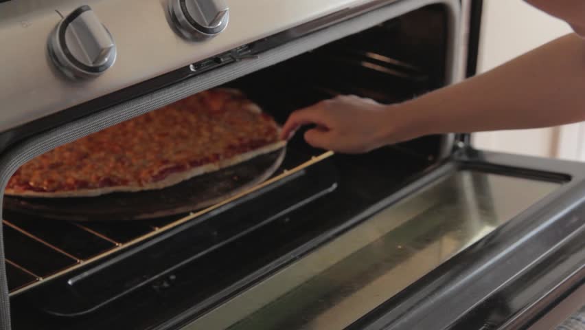 Baking a homemade pizza in a hot oven