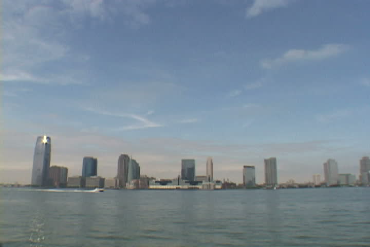 Hudson River from New York City shows New Jersey downtown in real time with boat