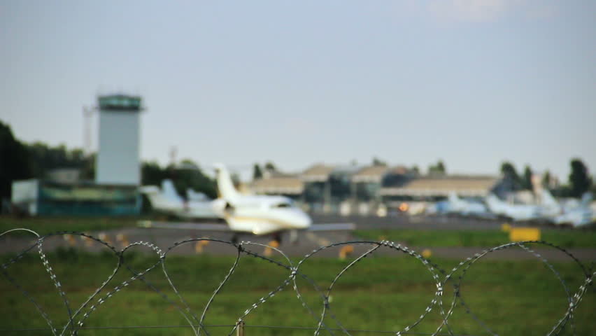 Airport rack focus, jet steering on the runway