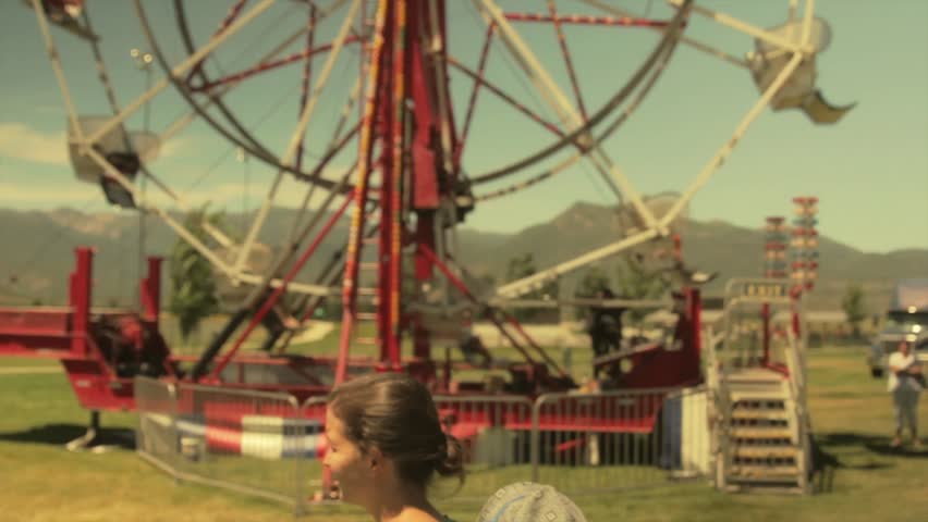 A young family at a small town carnival