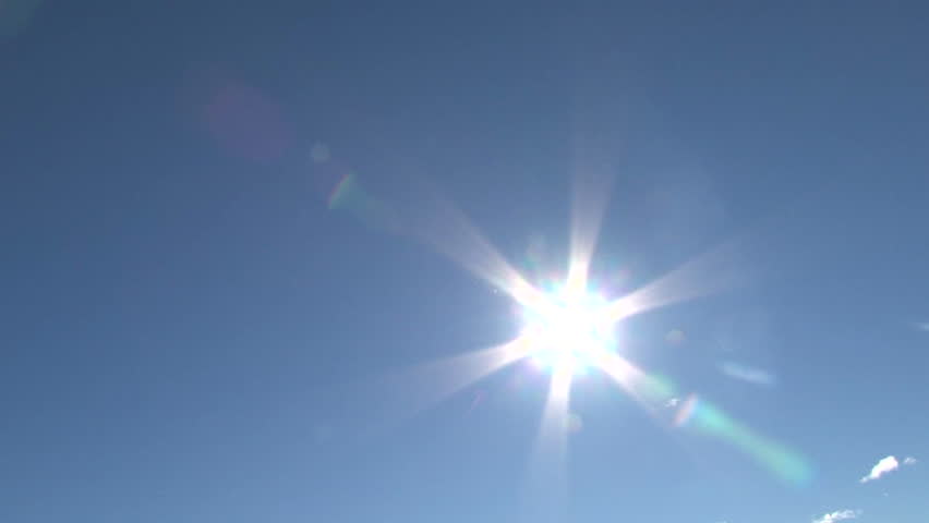 Blue sky day with bright sun shining bright, zoom in and pan. Royalty-Free Stock Footage #4466717
