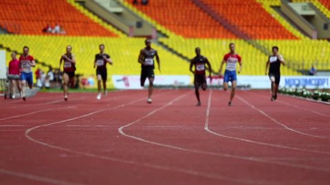 MOSCOW - JUN 11: Sportsmen run on track of Grand Sports Arena of Luzhniki Olympic Complex at international athletics competitions IAAF World Challenge Moscow Challenge on 11 June 2012, Moscow, Russia.