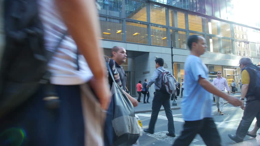NEW YORK CITY, Circa August, 2013 - Pedestrians cross the busy streets of