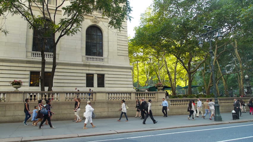 NEW YORK CITY, Circa August, 2013 - Pedestrians walk past the New York Public