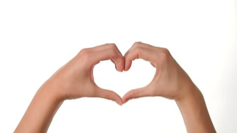 Female Hands Gesturing a Heart on white background