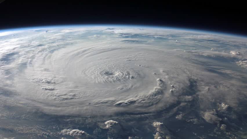 Satellite view of a large hurricane / typhoon with a well defined eye. (Elements furnished by NASA)