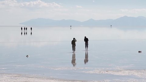 Salar Uyuni salt desert Bolivia people Stock Video
