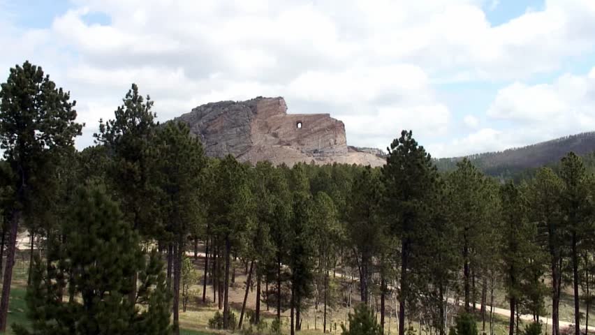 Wide static shot of Crazy Horse Monument,  Rapid City, South Dakota.  May 2013.