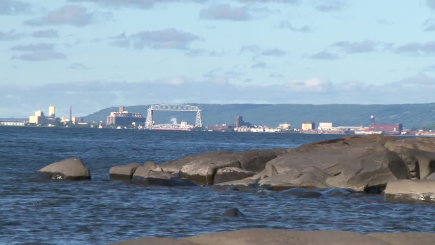 Lake Superior scenic on sunny, blue sky day, zoom in to downtown Duluth