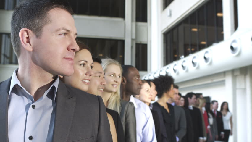 Large group of businessmen and businesswomen in the city
