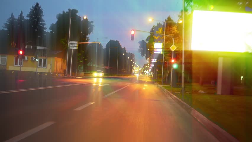 Night driving city road timelapse, starglow from the lights and blur motion-