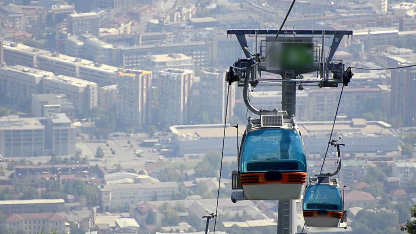 Skopje seen from Vodno mountain. Car gondola cable lift transports people to the