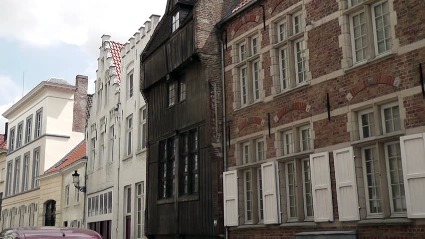 BRUGES, FLANDERS, BELGIUM, JULY 2011: Facade of an original medieval wooden house.