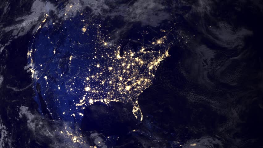 Telecommunication satellite over earth North America night space view.. Cinema
