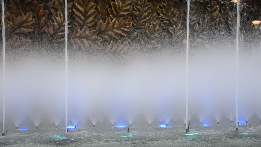 Spray, splash and jet of water. Beautiful close up of fountain of water dancing