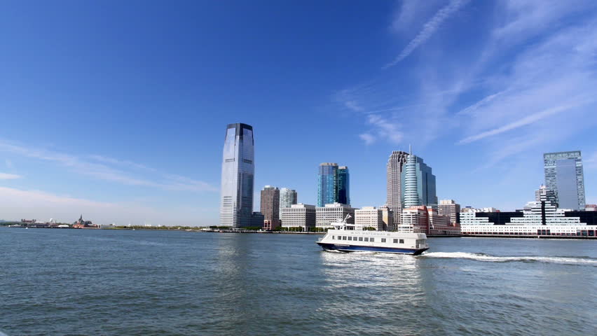 A New York ferry carries passengers over the East River between Manhattan and