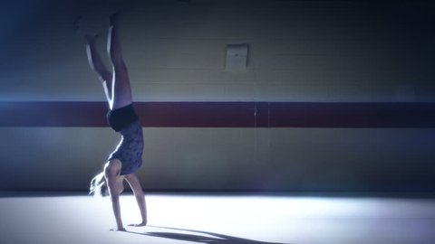 Gymnast floor work. Olympics sport in contemporary setting. Slow motion Shot on RED Epic at 240FPS