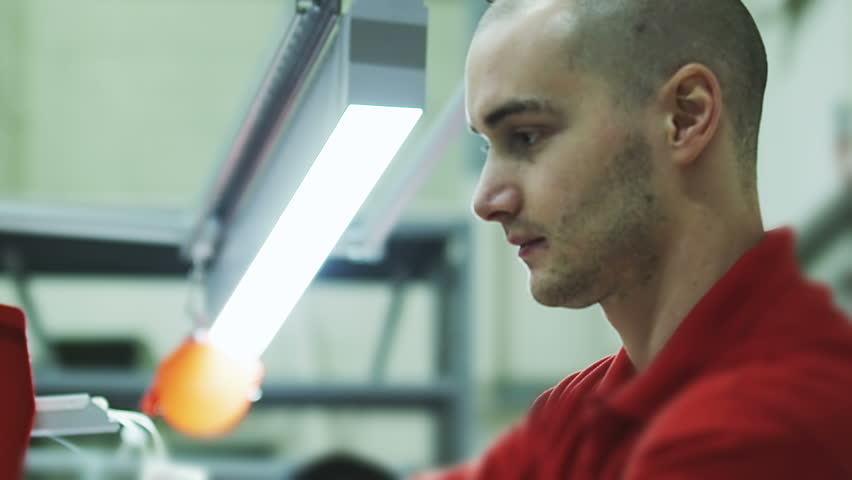 Manufacturing staff in production factory business. People examining product design.