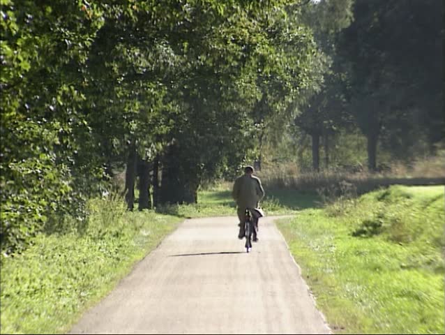 Cyclist on country road
