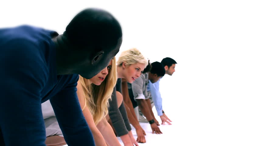 Stay ahead of the competition - Casual business team line up to race
