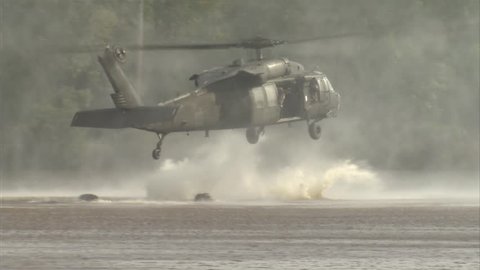 Military, Special operation soldiers jumping from helicopter