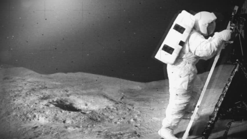 Astronaut moon landing and ground crew back on Earth waiting anxiously. Mock black and white 1960's space footage of the early moon surface landings. Royalty-Free Stock Footage #4503908