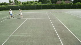 Young people playing Tennis