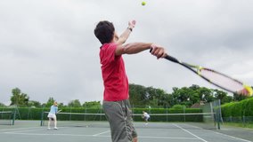 Young people playing Tennis
