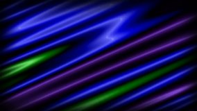Perfectly seamless abstract motion background features a fluid patter of emerald green, cobalt blue and violet purple.