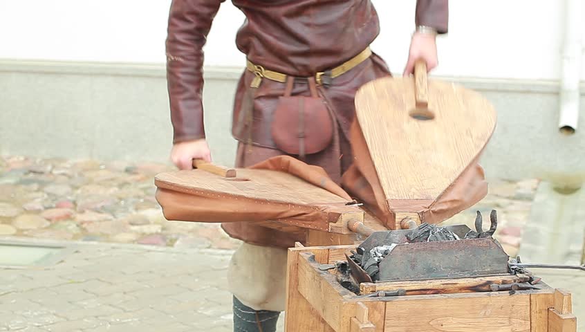blacksmith forges inflates fur hand